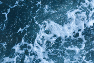 Texture of Black Sea. Background shot of blue frothy aqua sea water surface aerial view. Marine concept