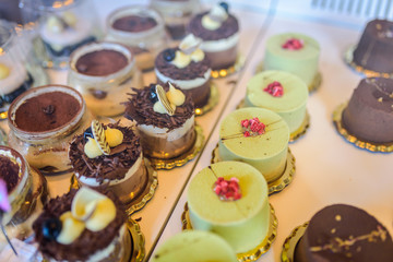 Variety of small cakes / dessert in a pastry shop
