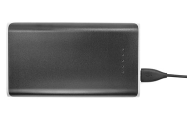 Fototapeta premium Black power bank Charger isolated on white background. Power bank for charging mobile devices. Smart phone charger with power bank (battery bank). External battery for mobile devices.