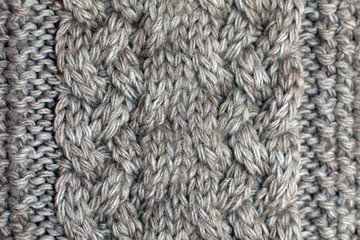 Gray knitted background medium thickness thread hobby leisure activities creativity abstract background texture