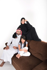 Arab Family sitting at home enjoying the time