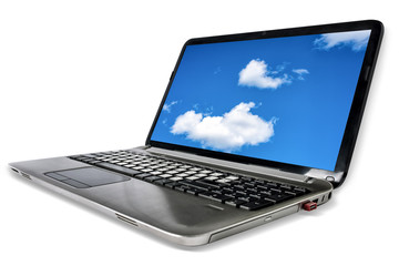 A laptop notebook with a blue sky on screen on white background. Copy space.