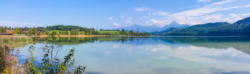 Fototapeta na wymiar Weissensee with panoramic view of the lake