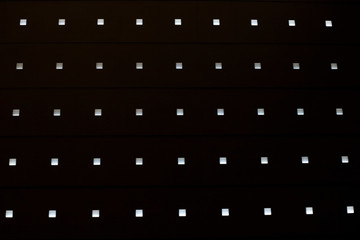 white squares on black background