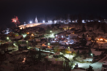 Fototapeta na wymiar Christmas night in the village.