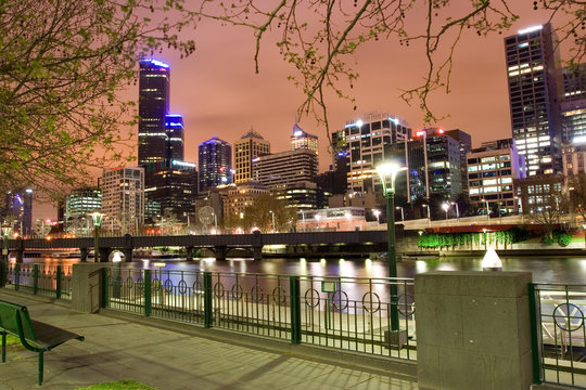 Melbourne Cityscape As Viewed From South Bank Across The Yarra River.