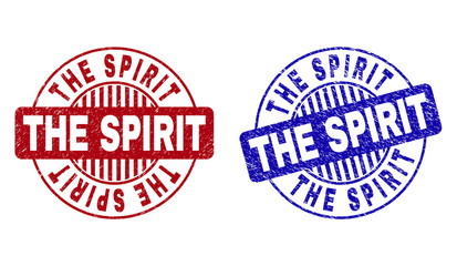 Grunge THE SPIRIT round stamp seals isolated on a white background. Round seals with grunge texture in red and blue colors. Vector rubber imprint of THE SPIRIT text inside circle form with stripes.