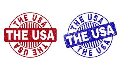 Grunge THE USA round stamp seals isolated on a white background. Round seals with grunge texture in red and blue colors. Vector rubber overlay of THE USA text inside circle form with stripes.