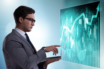 Businessman in futuristic stock trading concept