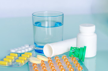 Different medicines: tablets, pills in blister pack, medications drugs, macro, selective focus, copy space