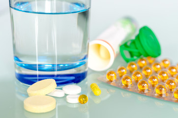 Different medicines: tablets, pills in blister pack, medications drugs, macro, selective focus, copy space