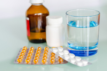 Different medicines: tablets, pills in blister pack, medications drugs, macro, selective focus,...
