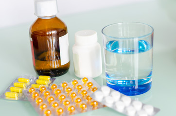 Different medicines: tablets, pills in blister pack, medications drugs, macro, selective focus, copy space