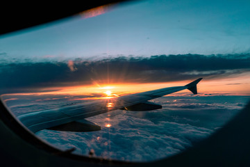Airplane Flight at Sunset