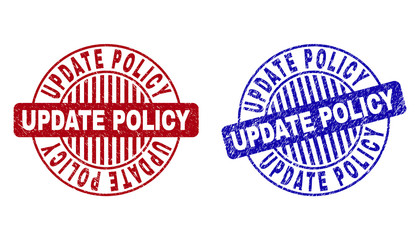 Grunge UPDATE POLICY round stamp seals isolated on a white background. Round seals with grunge texture in red and blue colors.