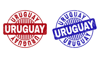 Grunge URUGUAY round stamp seals isolated on a white background. Round seals with grunge texture in red and blue colors. Vector rubber imprint of URUGUAY caption inside circle form with stripes.