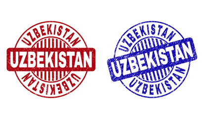 Grunge UZBEKISTAN round stamp seals isolated on a white background. Round seals with grunge texture in red and blue colors. Vector rubber watermark of UZBEKISTAN text inside circle form with stripes.