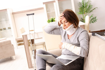 Woman after car accident suffering at home 