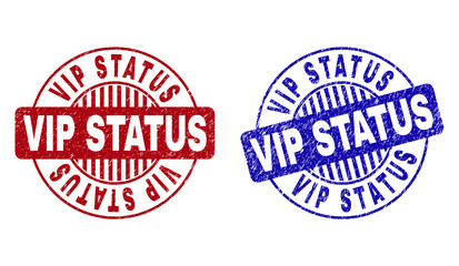 Grunge VIP STATUS round stamp seals isolated on a white background. Round seals with grunge texture in red and blue colors. Vector rubber overlay of VIP STATUS title inside circle form with stripes.