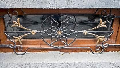 twisted metal fence basement window