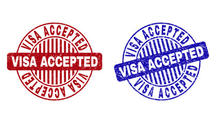 Grunge VISA ACCEPTED round stamp seals isolated on a white background. Round seals with grunge texture in red and blue colors.