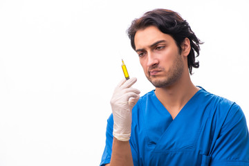 Young handsome doctor isolated on white 