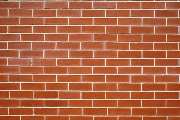 Fototapeta premium facade view of red brick wall background