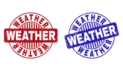 Grunge WEATHER round stamp seals isolated on a white background. Round seals with grunge texture in red and blue colors. Vector rubber imprint of WEATHER label inside circle form with stripes.