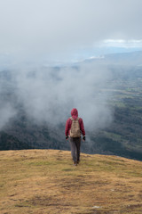 man on top of mountain