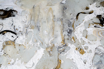 Plakat Marble background texture with gold, black, grey and white colors, using acrylic pouring medium art technique. Useful as a backdrop or background, or copy space. Beautiful paint splatter abstract art.
