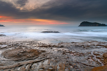 Soft High Cloud Sunrise Seascape from Rock Platform