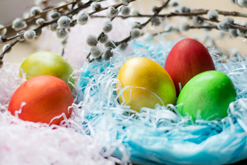 Easter eggs in blue tinsel