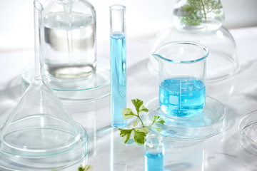 cosmetic laboratory research and development . science bio skincare cream serum product with...