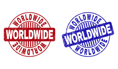 Grunge WORLDWIDE round stamp seals isolated on a white background. Round seals with grunge texture in red and blue colors. Vector rubber overlay of WORLDWIDE tag inside circle form with stripes.