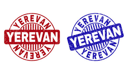 Grunge YEREVAN round stamp seals isolated on a white background. Round seals with grunge texture in red and blue colors. Vector rubber overlay of YEREVAN label inside circle form with stripes.