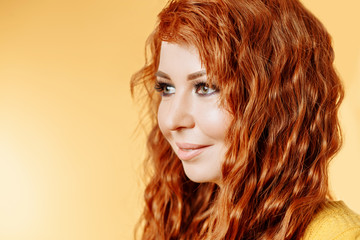 Fototapeta premium Close up portrait of young beautiful redhead girl