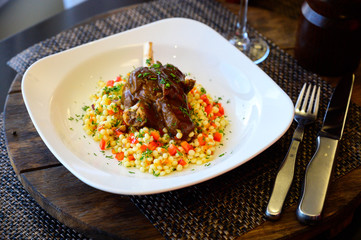 Fried meat with corn sauce on a plate