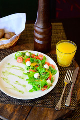Quail Egg Salad with Lettuce and Tomatoes on a Plate