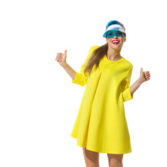 Happy Fashion Model In Yellow Mini Dress Is Showing Thumbs Up