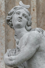 Statue of ancient sensual naked Renaissance Era woman in Potsdam, Germany, details, closeup