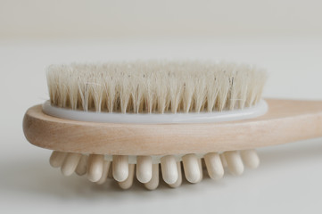 Wooden brush with natural bristle for dry body massage or peeling