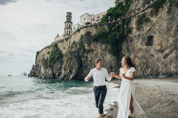 Young wedding couple having fun Time  in Italy.