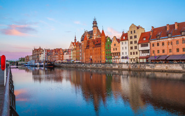 Fototapeta na wymiar Gdansk old town and famous crane at amazing sunrise. Gdansk. Poland