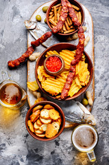 Lager beer and snacks