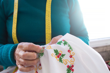 woman sewing sitting at home