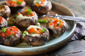 Mushrooms stuffed with mozzarella and tomatoes