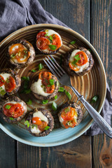 Mushrooms stuffed with mozzarella and tomatoes