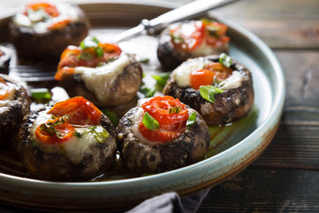Mushrooms stuffed with mozzarella and tomatoes