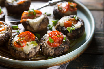 Mushrooms stuffed with mozzarella and tomatoes