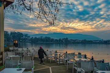 Sunset on lake Pamvotis  at a wintry day. Ioannina city, Greece